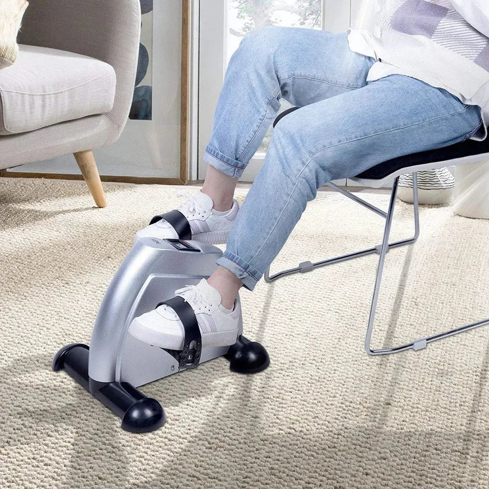 Adjustable mini exercise bike from The Peak Pivot designed for under-desk use, featuring compact size and easy-to-use pedals.