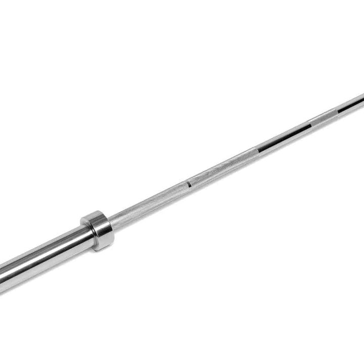 Barbell Standard 2000 power barbell weight set with multiple weight plates and bar for strength training and lifting exercises.