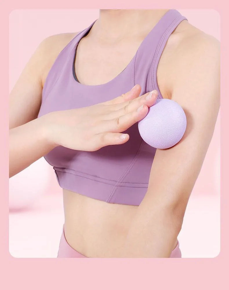massage ball for deep tissue relief, showing a textured rubber ball used for muscle relaxation and pain relief.