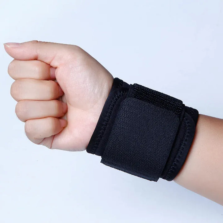 Adjustable wrist support brace by The Peak Pivot, featuring adjustable straps and padded design for comfort and stability.