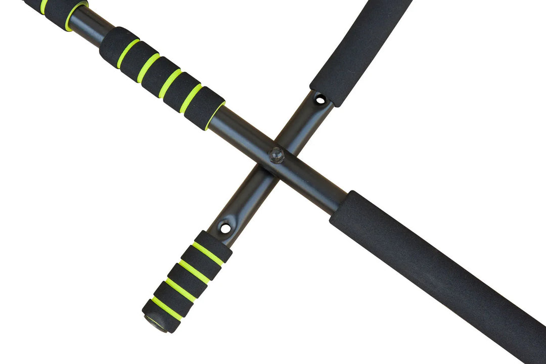 Wall mounted pull-up bar installed on a home gym wall for strength training exercises
