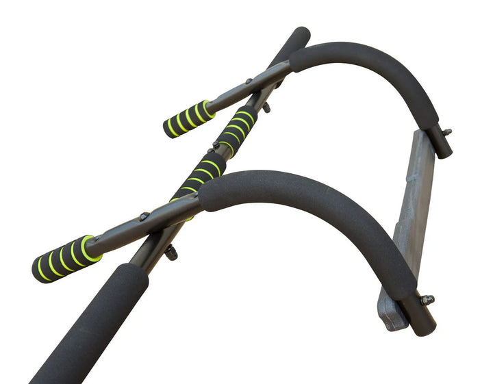 Wall mounted pull-up bar installed on a home gym wall for upper body workouts and strength training.
