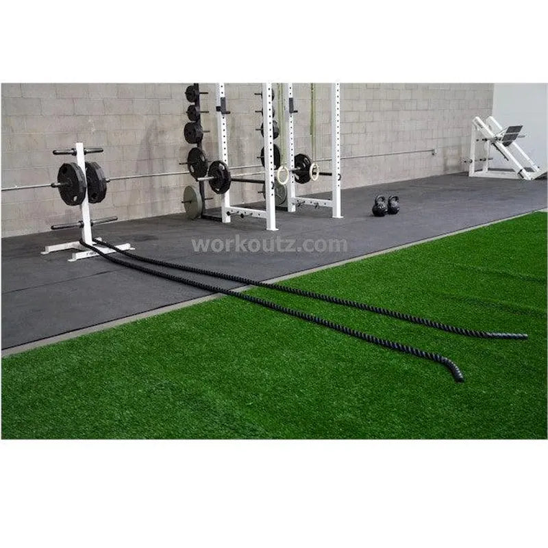 Heavy-duty battle ropes for strength and conditioning by The Peak Pivot, showing thick, durable ropes coiled ready for workout use.