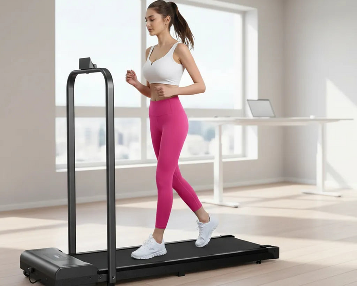 Under desk treadmill with LED display and compact design for walking while working.