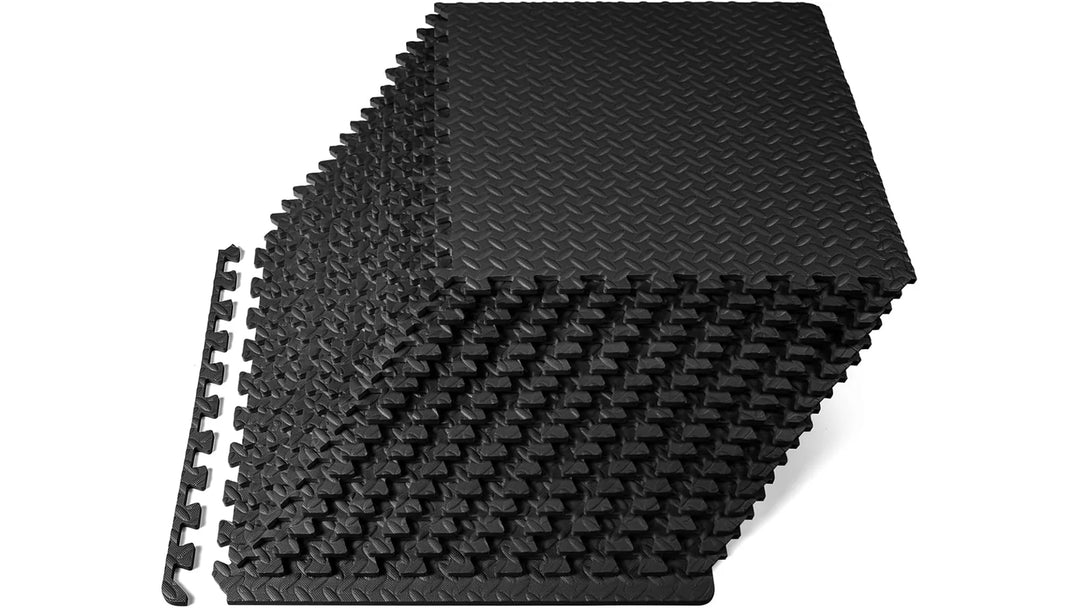 Black exercise puzzle mat in a 12-pack, shown assembled with interlocking foam tiles for workout and fitness floor cushioning.