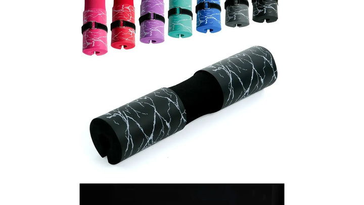 The Peak Pivot Ultimate Barbell Squat Pad wrapped around a barbell for comfortable weightlifting.