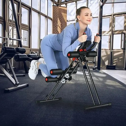 Foldable Ab Trainer machine from The Peak Pivot for core workouts, featuring a compact bench design with adjustable support.