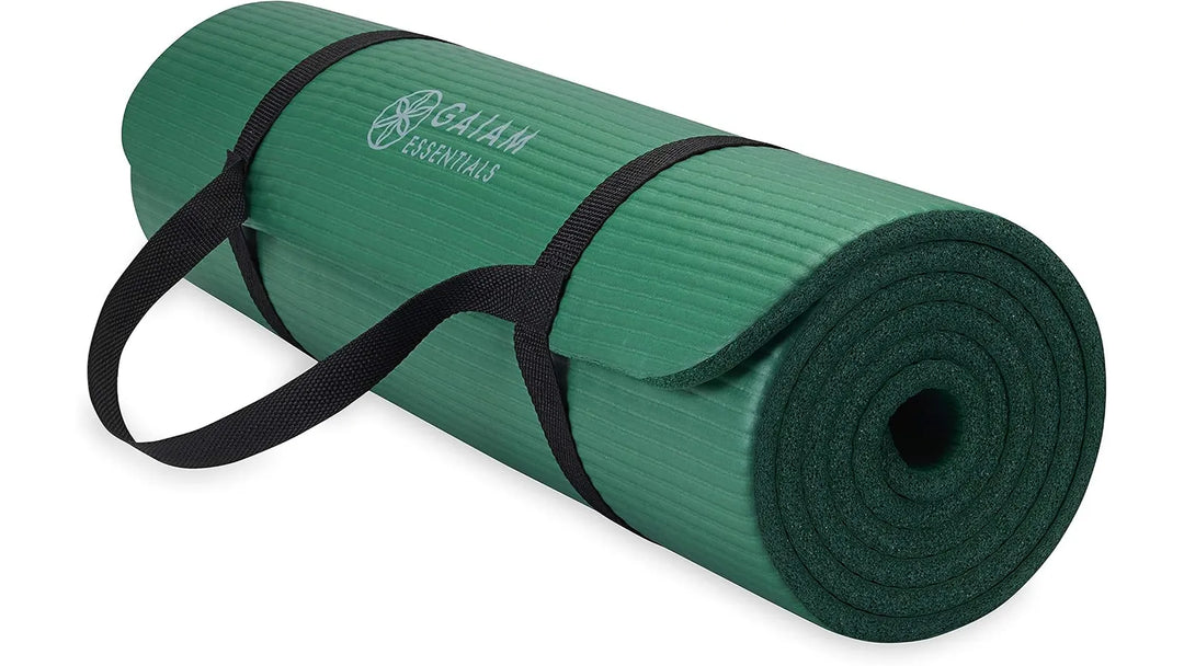 Green Gaiam Essentials yoga mat by The Peak Pivot, showing textured surface and non-slip design for comfortable practice