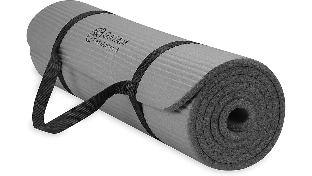 Grey Gaiam Essentials Yoga Mat by The Peak Pivot, showing textured surface and comfortable cushioning for yoga practice.