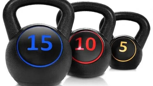 Set of kettlebell weights from The Peak Pivot, full body training kit with various weight sizes for strength workouts.