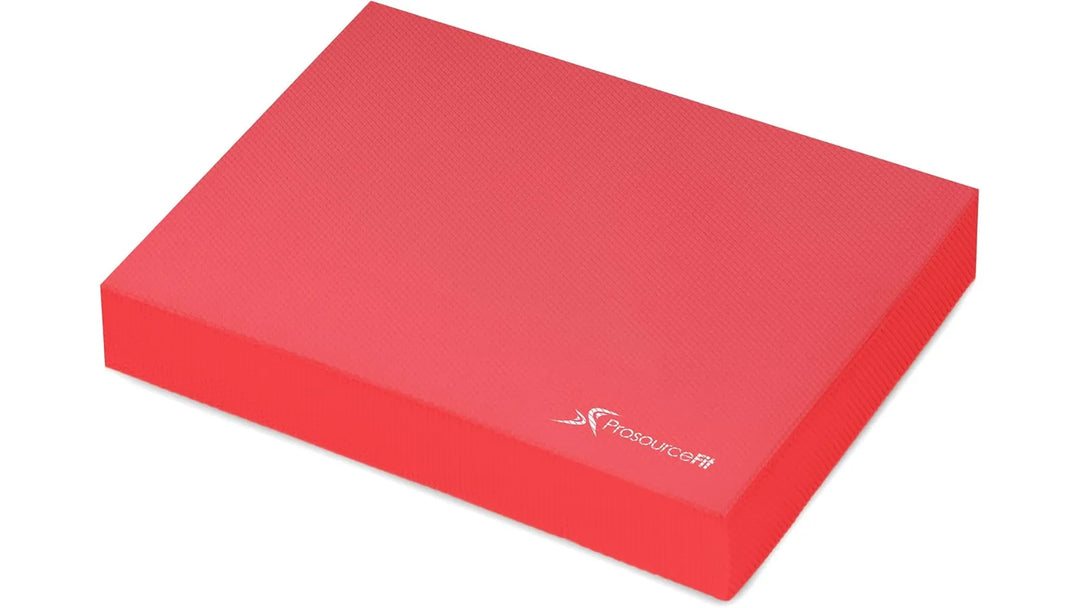 Non-slip foam balance pad for stability and exercise, featuring a cushioned, textured surface for secure footing.