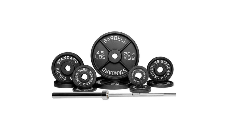 Barbell Standard 1500 Olympic weight set with multiple weight plates and barbell for strength training and weightlifting.