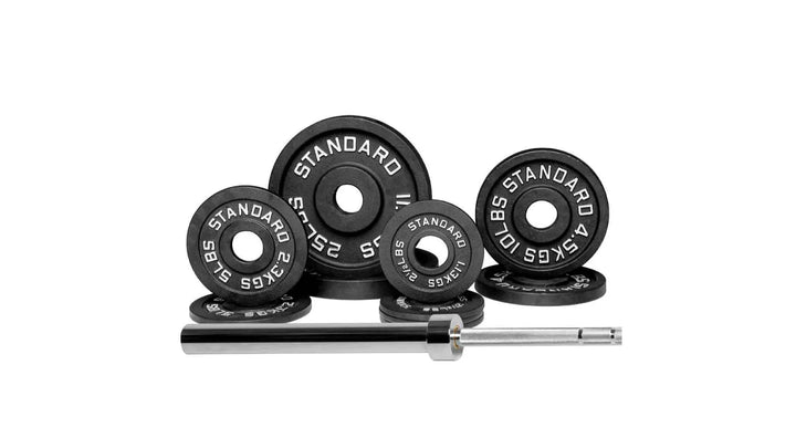 Olympic Barbell 1500 standard weight set with multiple plates and bar for strength training and weightlifting exercises.