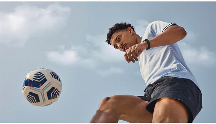 Fitbit Inspire 3 fitness tracker by The Peak Pivot showing heart rate monitor and sleep tracking features on a sleek display.