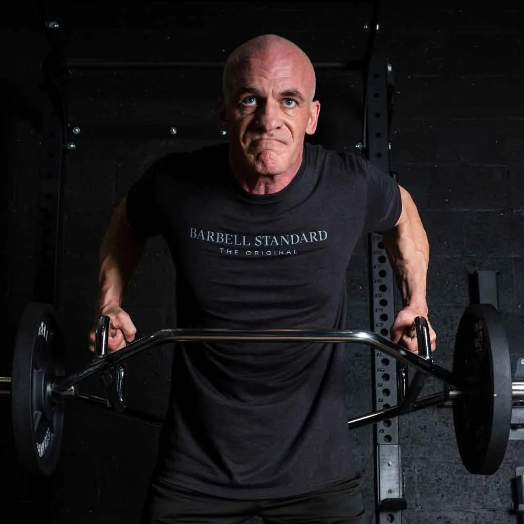 Olympic hex barbell by Barbell Standard with durable steel construction and ergonomic handles for weightlifting exercises.