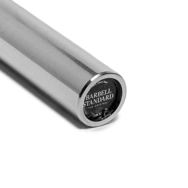 Olympic hex barbell from Barbell Standard with black knurled handles and sturdy steel construction for weightlifting exercises.